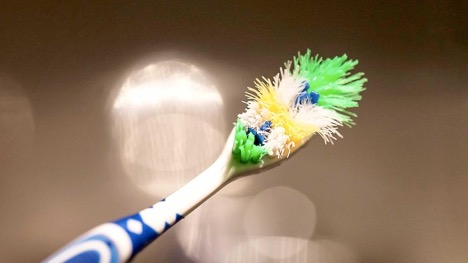 Does Your Toothbrush Look Like This? Your Gums May Be Receding
