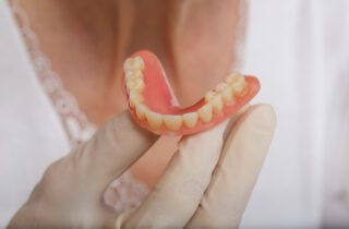 How Implants Can Improve Dentures